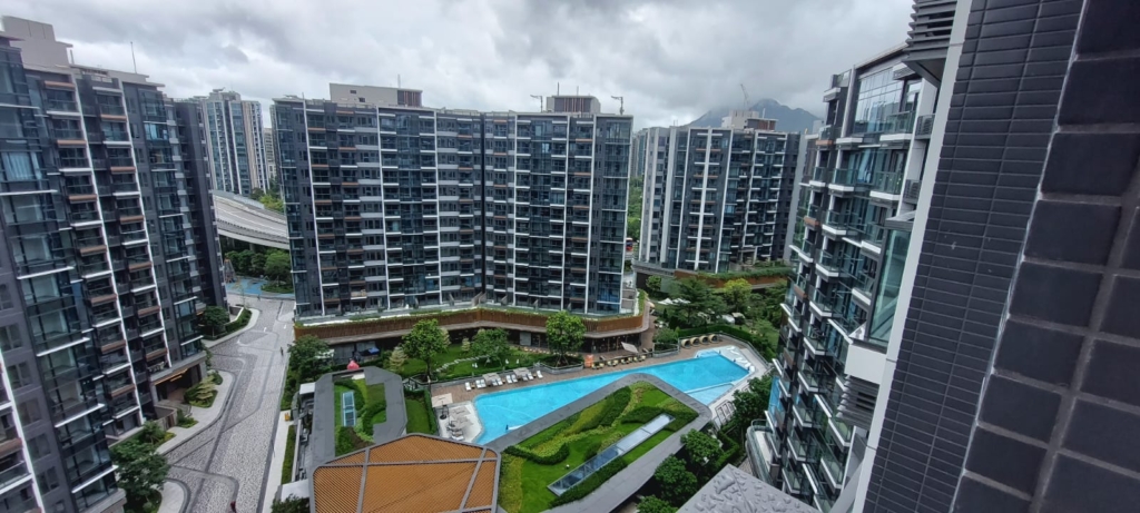 a group of buildings with a pool in University Hill