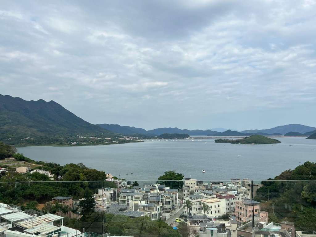 The beverly hill next to a body of water